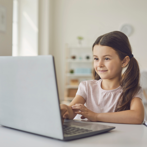 Girl viewing something on a laptop
